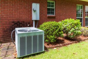 an old HVAC system outside an older home that needs to be upgraded